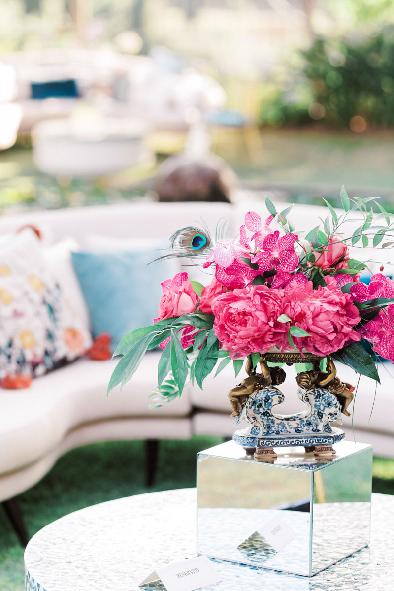Bright pink flower arrangements for chill out area wedding Anantara Villa Padierna