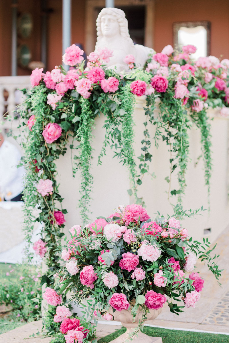 Bright pink and greenery flower decoration wedding Anantara Villa Padierna